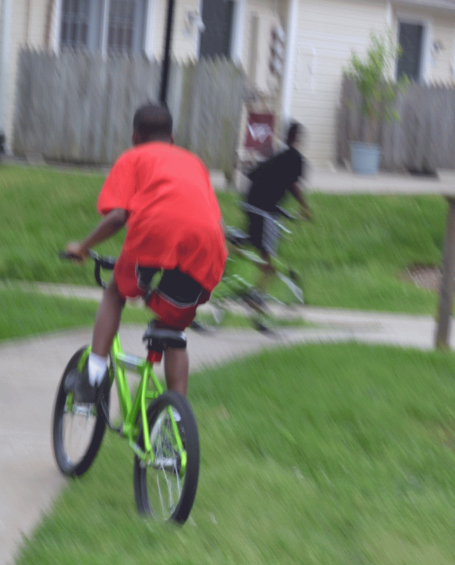 red-shirt-on-a-bike
